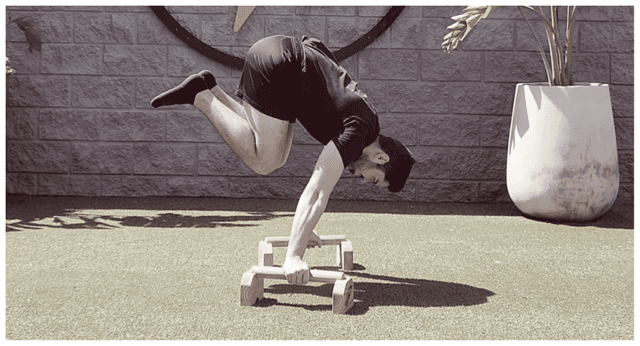 Planche press to handstand exercise